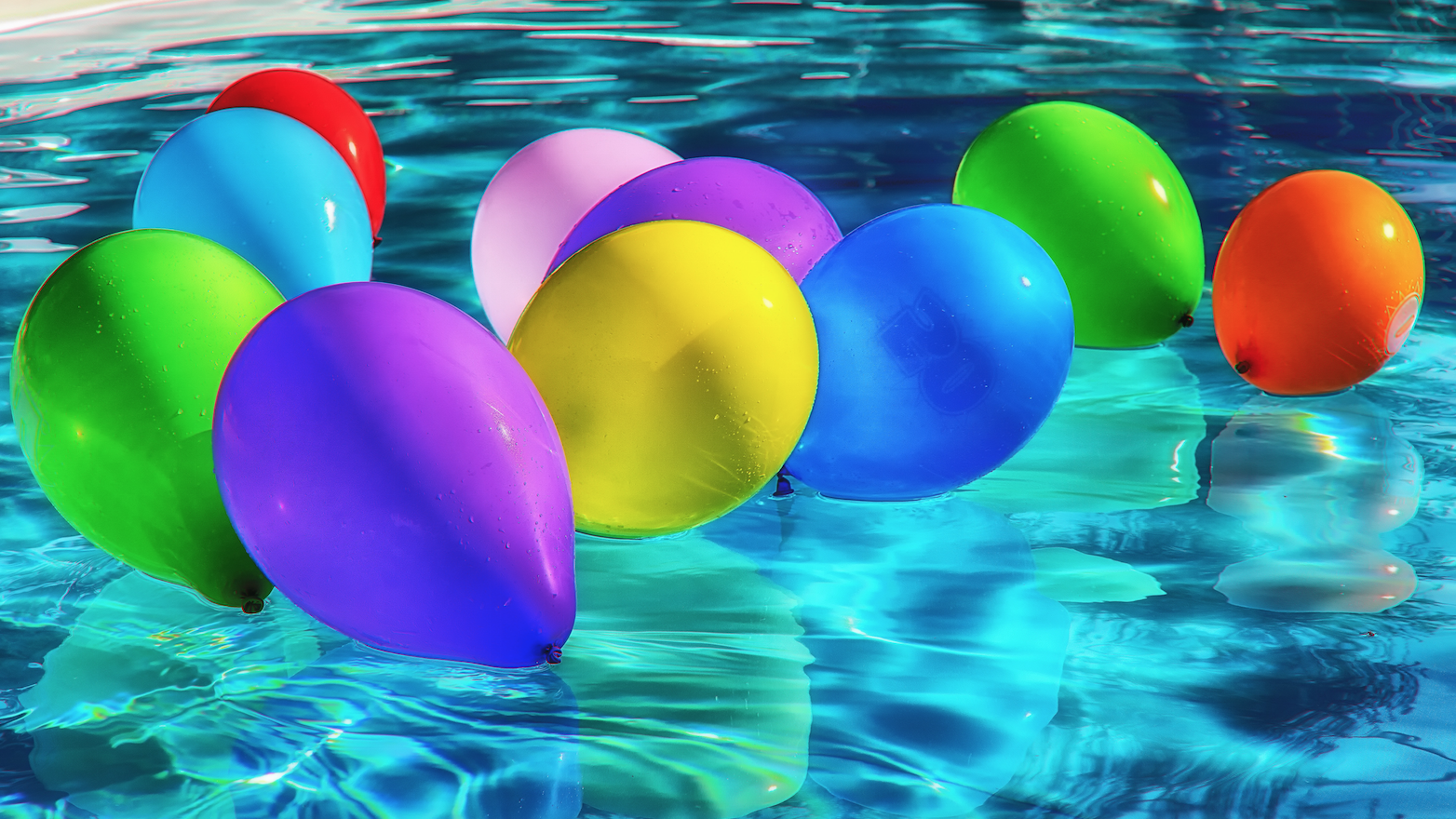 balloons floating on water