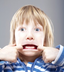boy-pulling-a-face-269x300